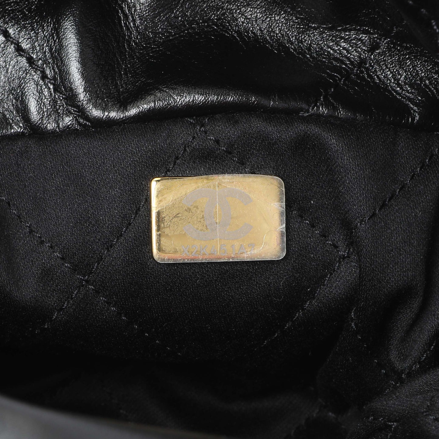 Exclusive Chanel Black Shiny Calfskin Quilted Mini Chanel 22 — Lifestyle View