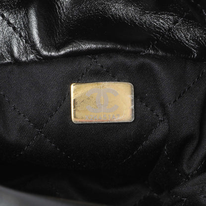 Exclusive Chanel Black Shiny Calfskin Quilted Mini Chanel 22 — Lifestyle View