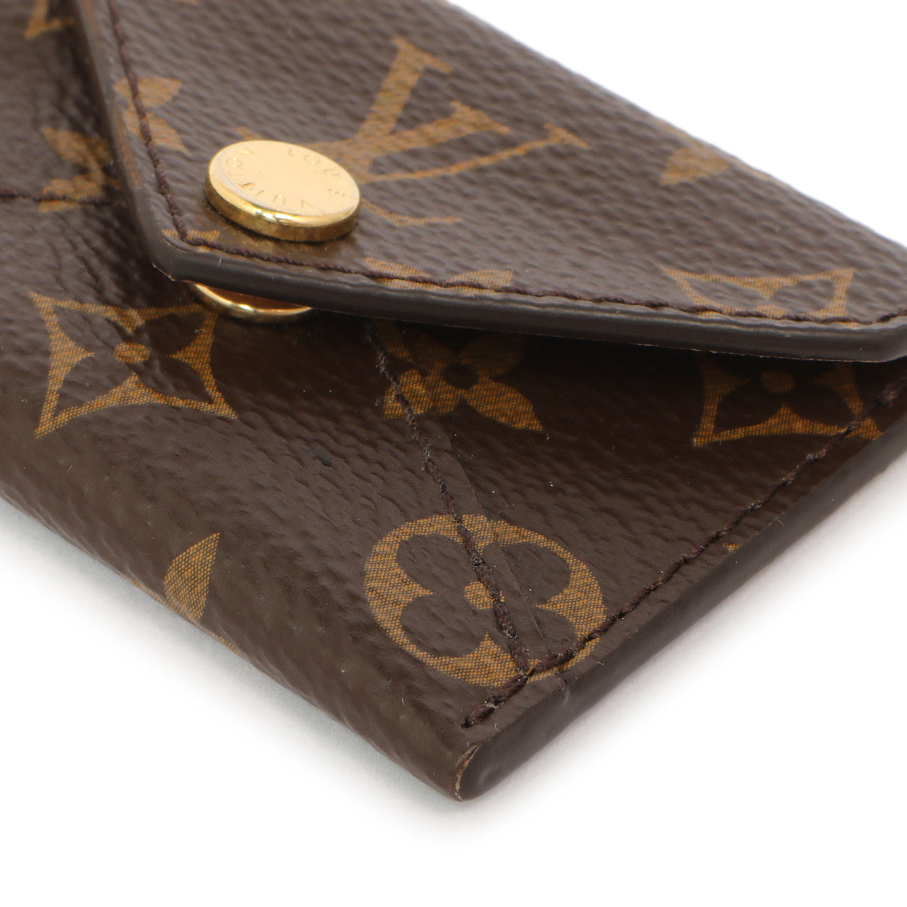 Exclusive Louis Vuitton Monogram Kirigami Pouch Bag Charm and Key Holder — Detail View