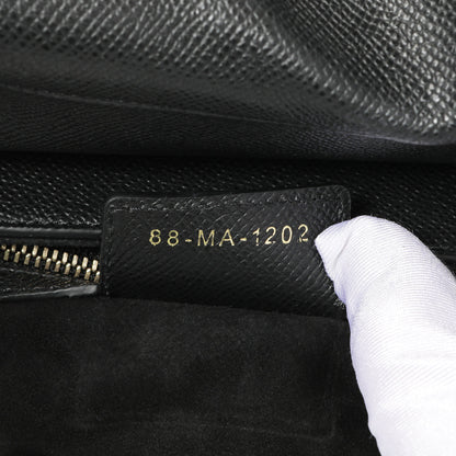Exclusive Christian Dior Black Grained Calfskin Saddle Bag — Lifestyle View