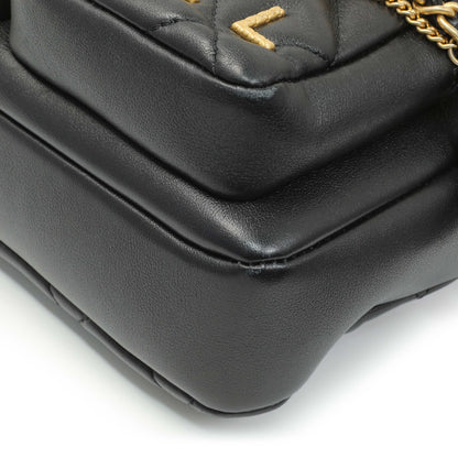 Exclusive Chanel Black Quilted Calfskin Small Camera Case — Lifestyle View
