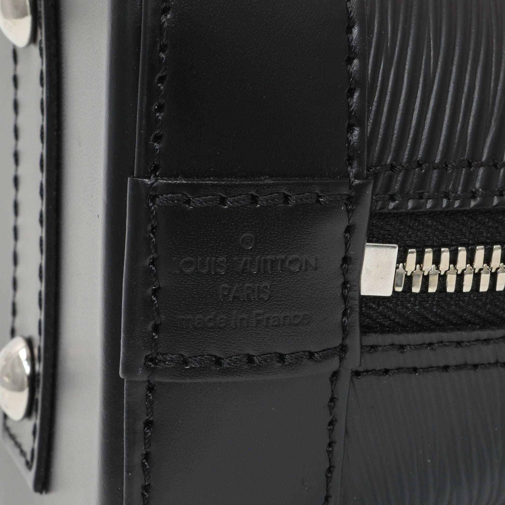 Exclusive Louis Vuitton Black Epi Alma BB with Strap — Detail View