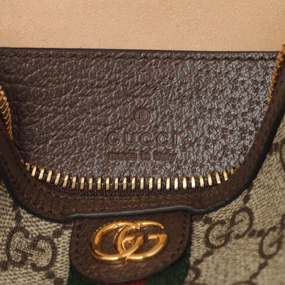 Exclusive Gucci Ophidia GG Top Handle Mini Bag — Lifestyle View