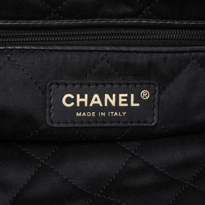 Exclusive Chanel Black Quilted Shiny Calfskin Small Chanel 22 — Detail View