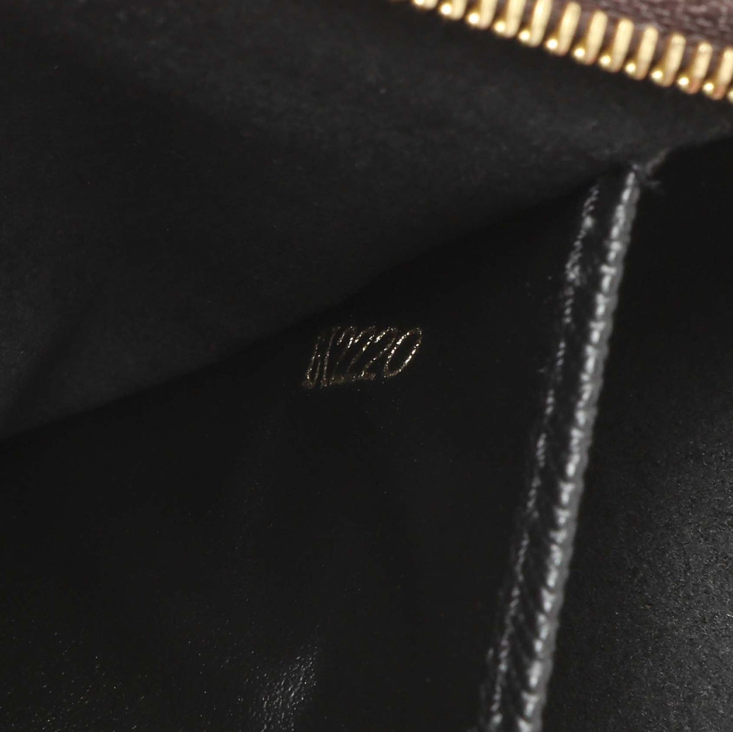 Exclusive Louis Vuitton Reverse Monogram Giant Double Zip Pochette — Lifestyle View