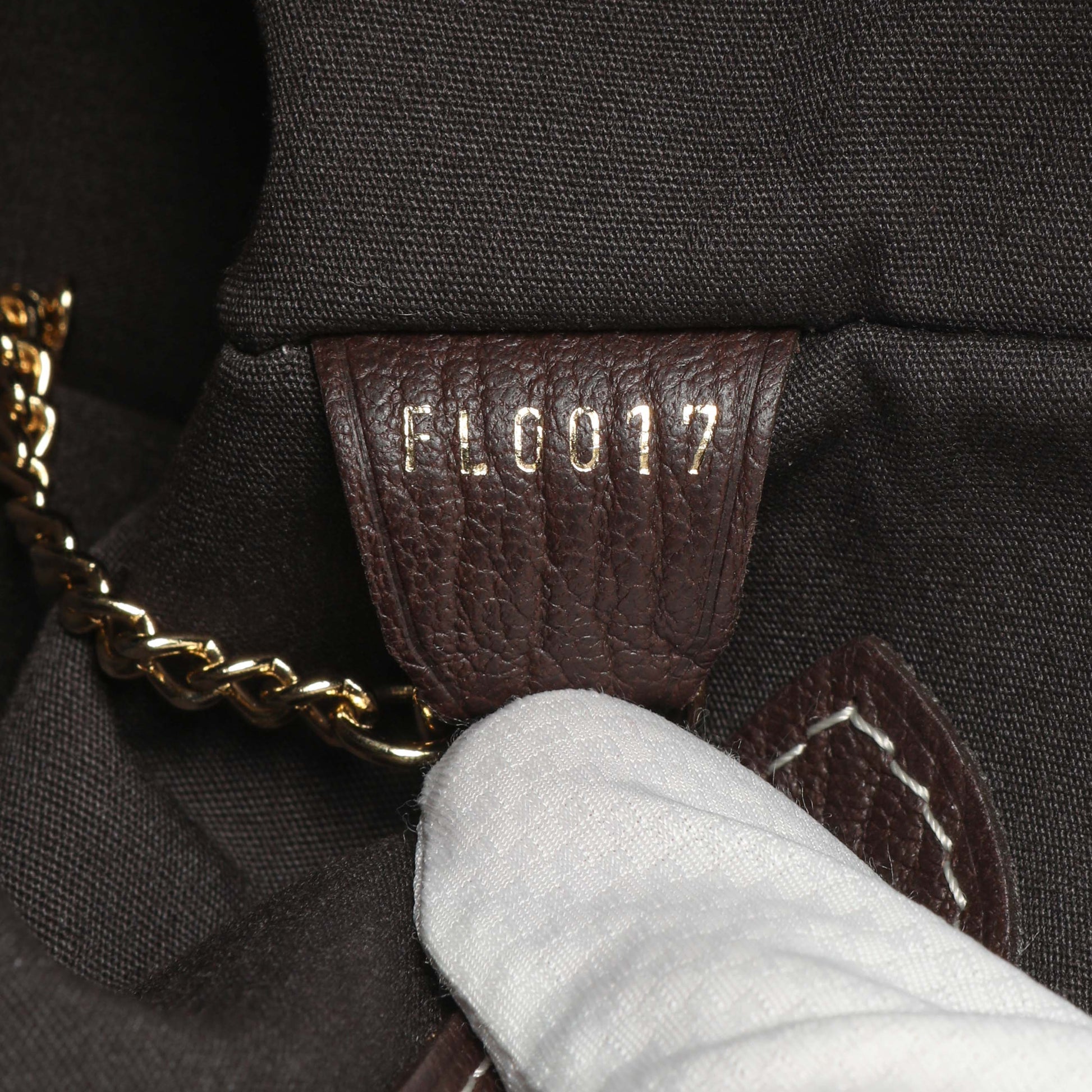 Exclusive Louis Vuitton Ebene Mini Lin Petit Bucket — Lifestyle View