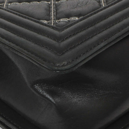 Exclusive Chanel Black Quilted Iridescent Calfskin Embellished Double Stitch Medium Boy Bag — Lifestyle View