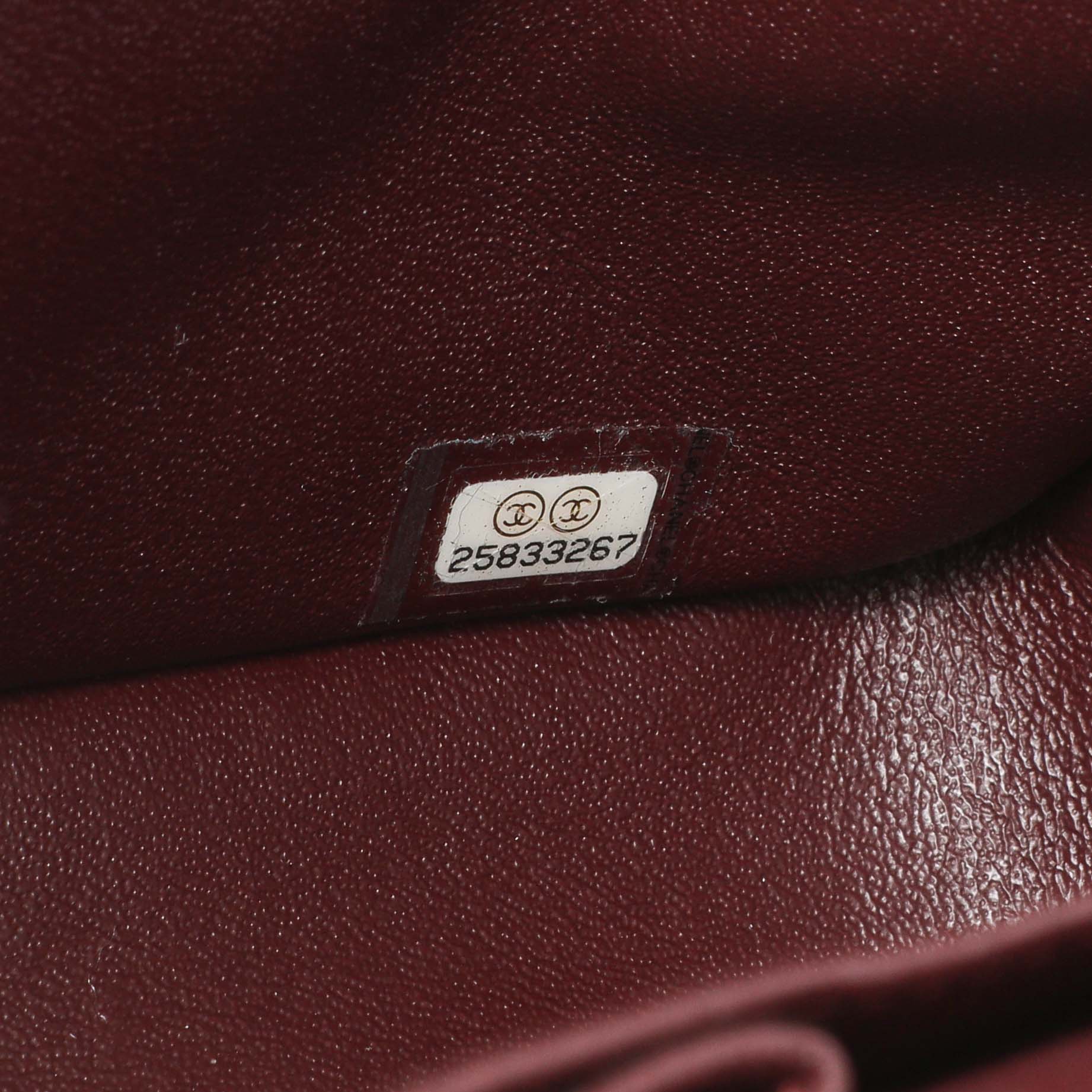 Exclusive Chanel Black Quilted Caviar Medium Classic Double Flap — Lifestyle View