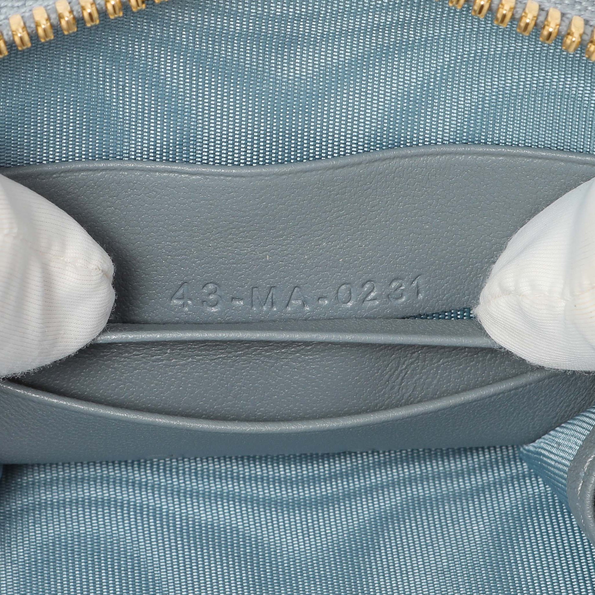 Exclusive Christian Dior Cloud Blue Lambskin Cannage Lady Dior Phone Holder — Lifestyle View