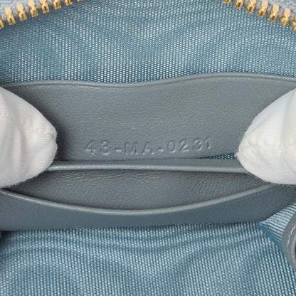 Exclusive Christian Dior Cloud Blue Lambskin Cannage Lady Dior Phone Holder — Lifestyle View