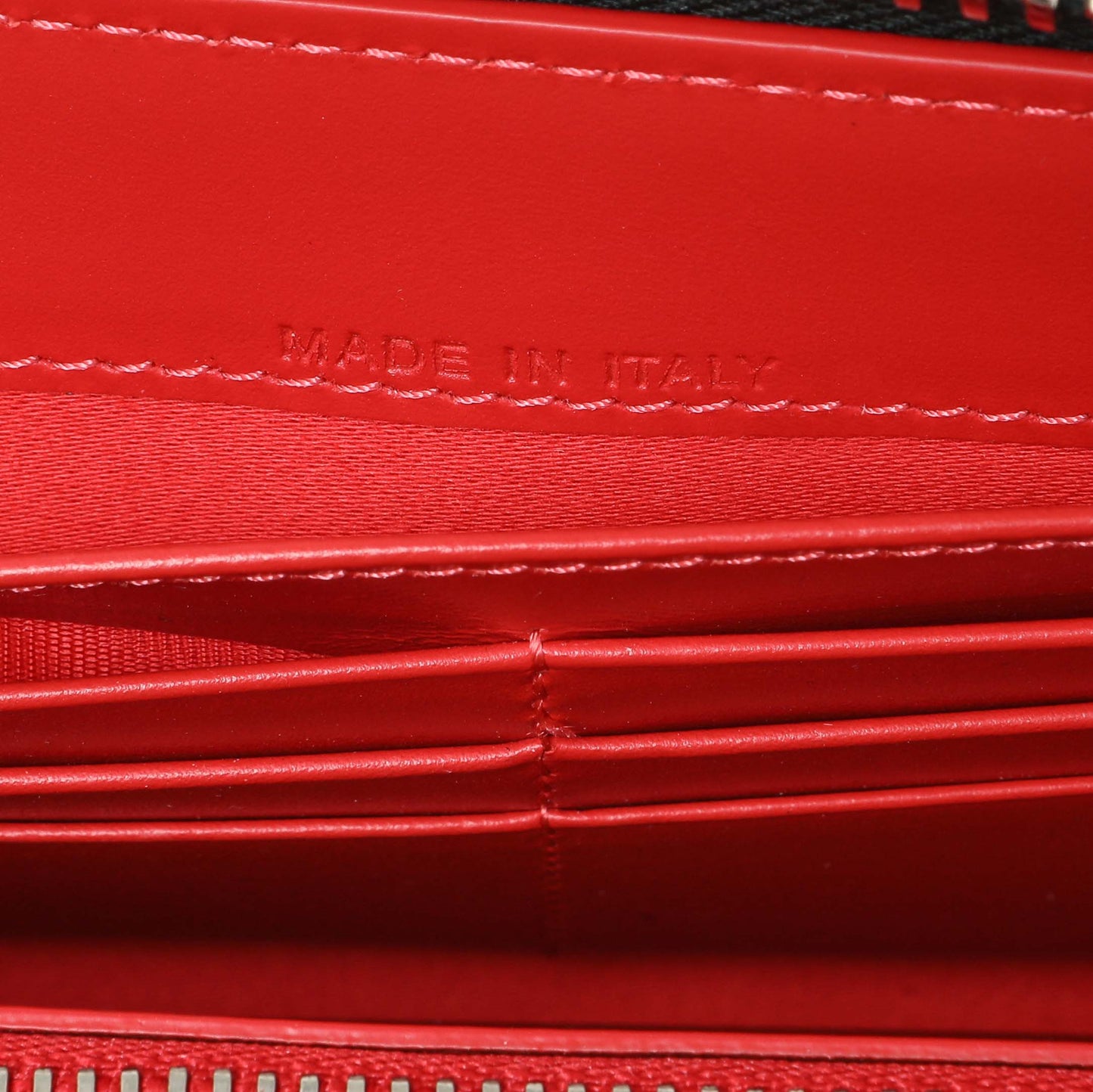 Exclusive Christian Louboutin Silver Patent Leather Panettone Spiked Zip Around Wallet — Lifestyle View