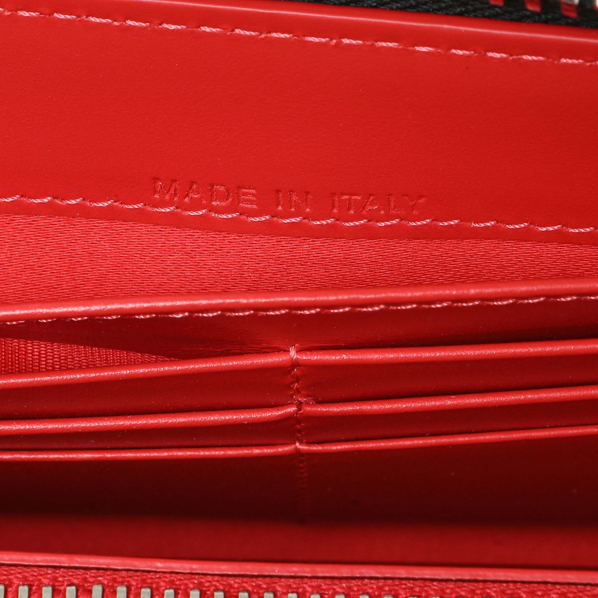 Exclusive Christian Louboutin Silver Patent Leather Panettone Spiked Zip Around Wallet — Lifestyle View