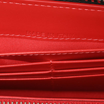 Exclusive Christian Louboutin Silver Patent Leather Panettone Spiked Zip Around Wallet — Lifestyle View