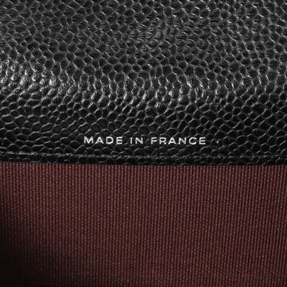 Exclusive Chanel Black Quilted Caviar Flap Card Holder — Lifestyle View