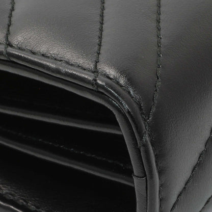 Exclusive Gucci Black Calfskin Matelasse GG Marmont Chain Wallet — Lifestyle View