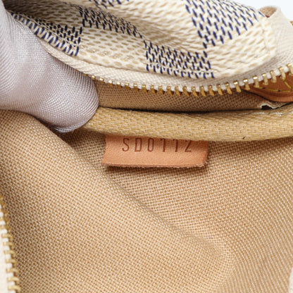 Exclusive Louis Vuitton Damier Azur Eva Clutch — Lifestyle View
