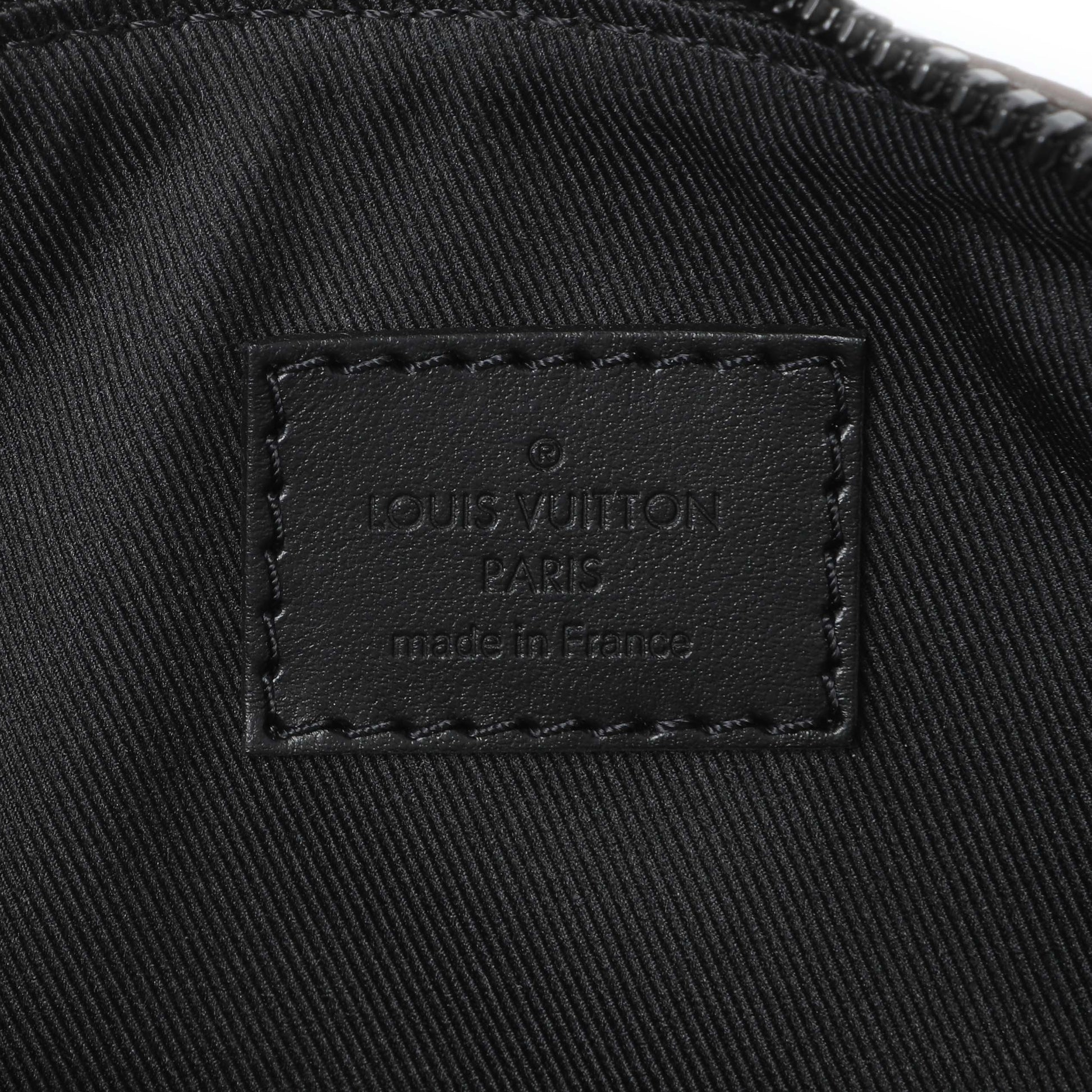 Exclusive Louis Vuitton Monogram LV Rubber Keepall XS — Detail View