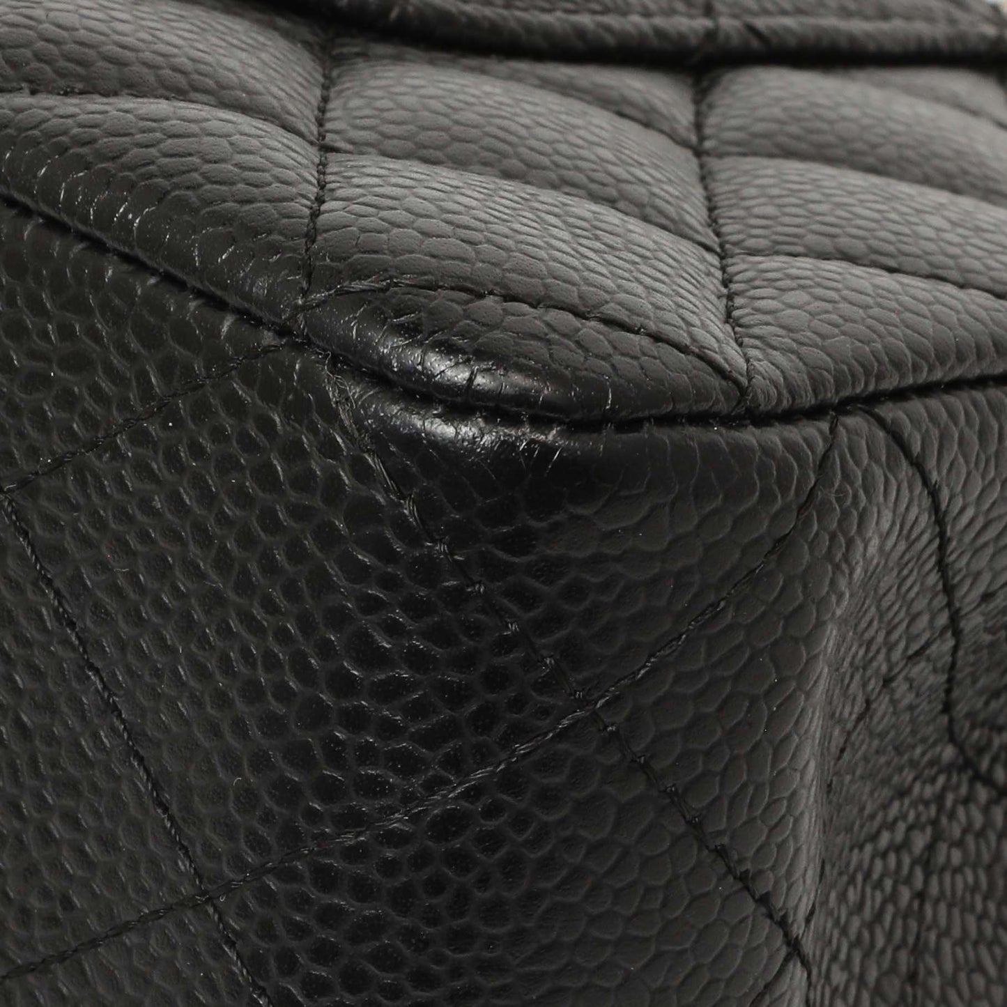 Exclusive Chanel Black Quilted Caviar Medium Classic Double Flap — Lifestyle View
