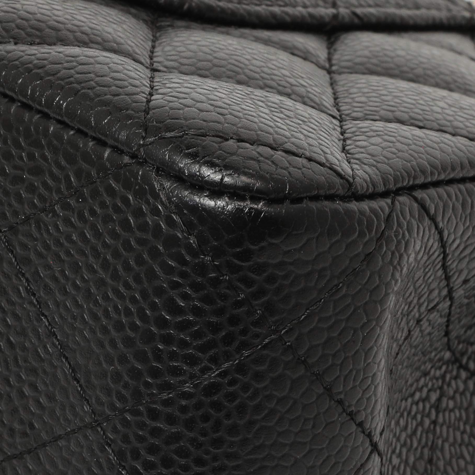 Exclusive Chanel Black Quilted Caviar Medium Classic Double Flap — Lifestyle View
