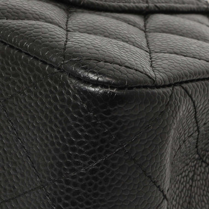 Exclusive Chanel Black Quilted Caviar Medium Classic Double Flap — Lifestyle View