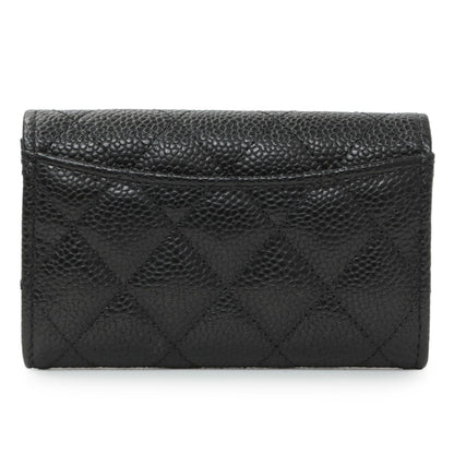 Exclusive Chanel Black Quilted Caviar Flap Card Holder — Side View