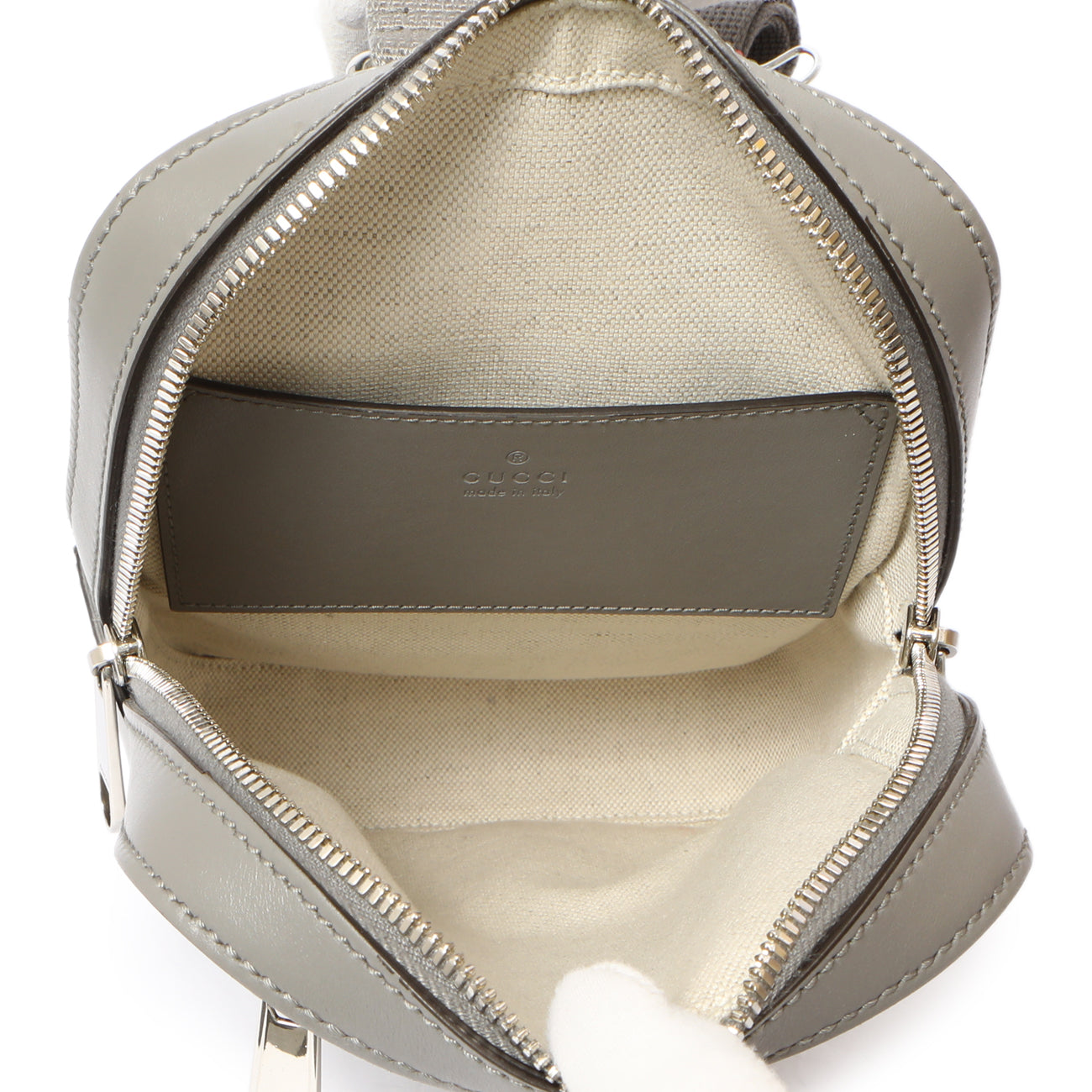 Exclusive Gucci Grey Calfskin GG Tennis Embossed Sling Backpack — Lifestyle View