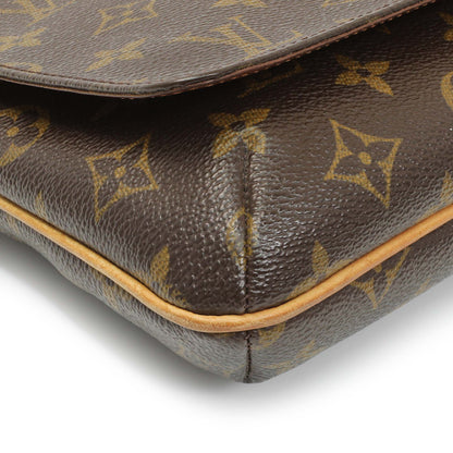 Exclusive Louis Vuitton Monogram Musette Tango Long Strap — Top View