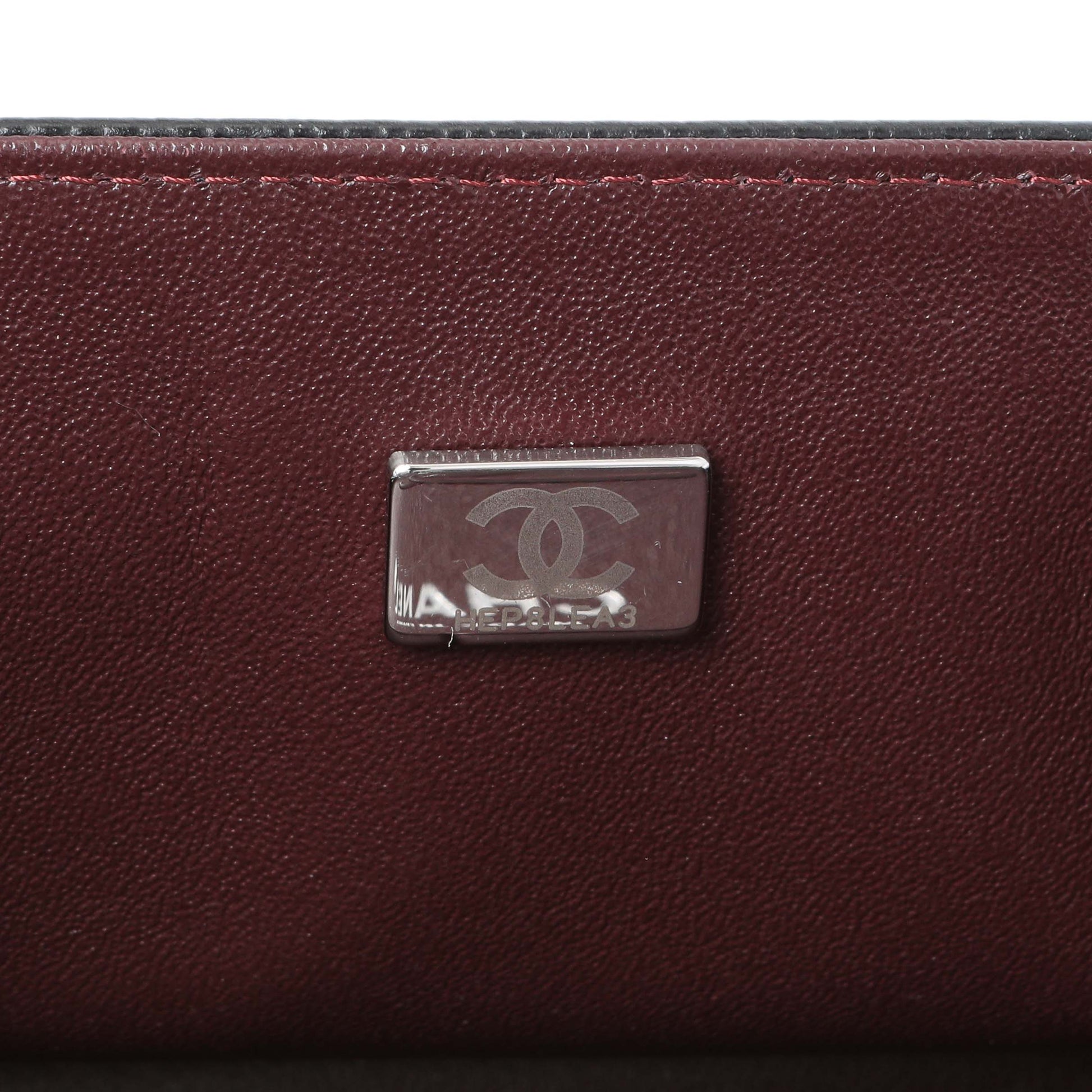 Exclusive Chanel Black Quilted Caviar Medium Double Flap — Lifestyle View