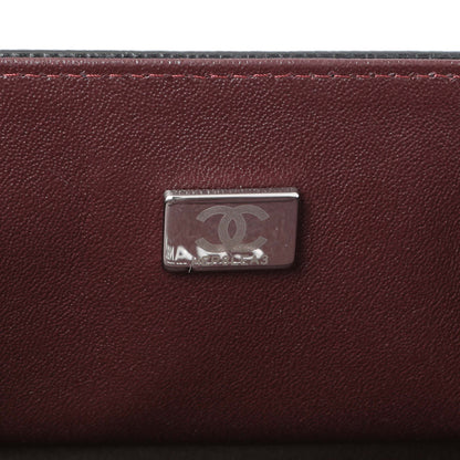 Exclusive Chanel Black Quilted Caviar Medium Double Flap — Lifestyle View