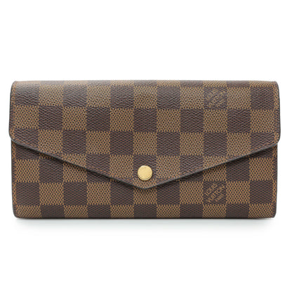 Exclusive Louis Vuitton Damier Ebene Sarah Wallet — Front View