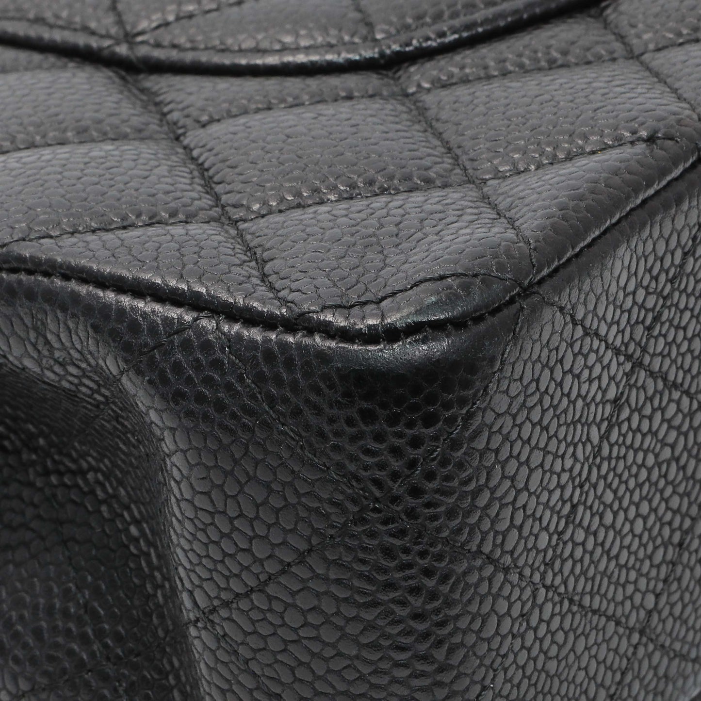Exclusive Chanel Black Quilted Caviar Medium Classic Double Flap — Lifestyle View