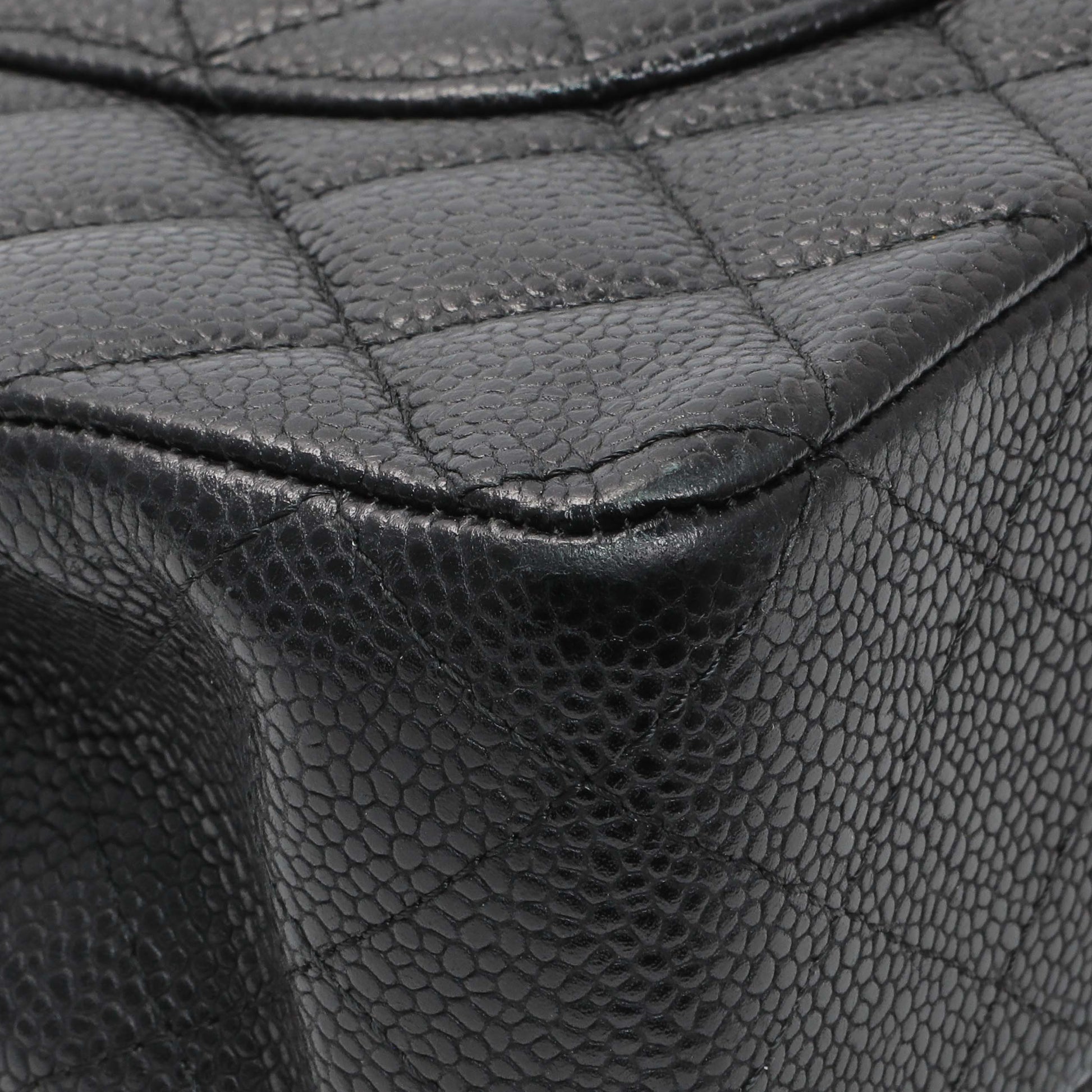 Exclusive Chanel Black Quilted Caviar Medium Classic Double Flap — Lifestyle View