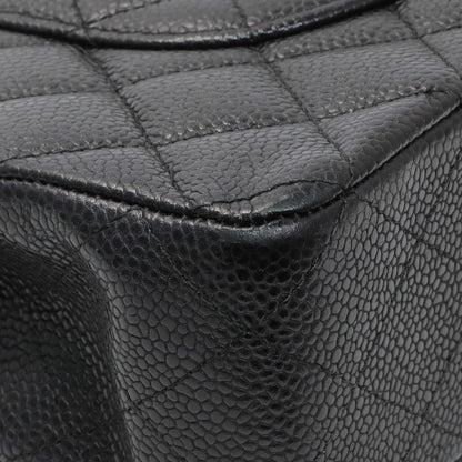 Exclusive Chanel Black Quilted Caviar Medium Classic Double Flap — Lifestyle View