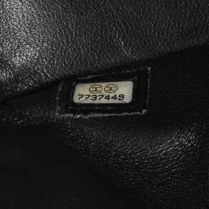 Exclusive Chanel Black Quilted Caviar Medium Classic Double Flap — Lifestyle View