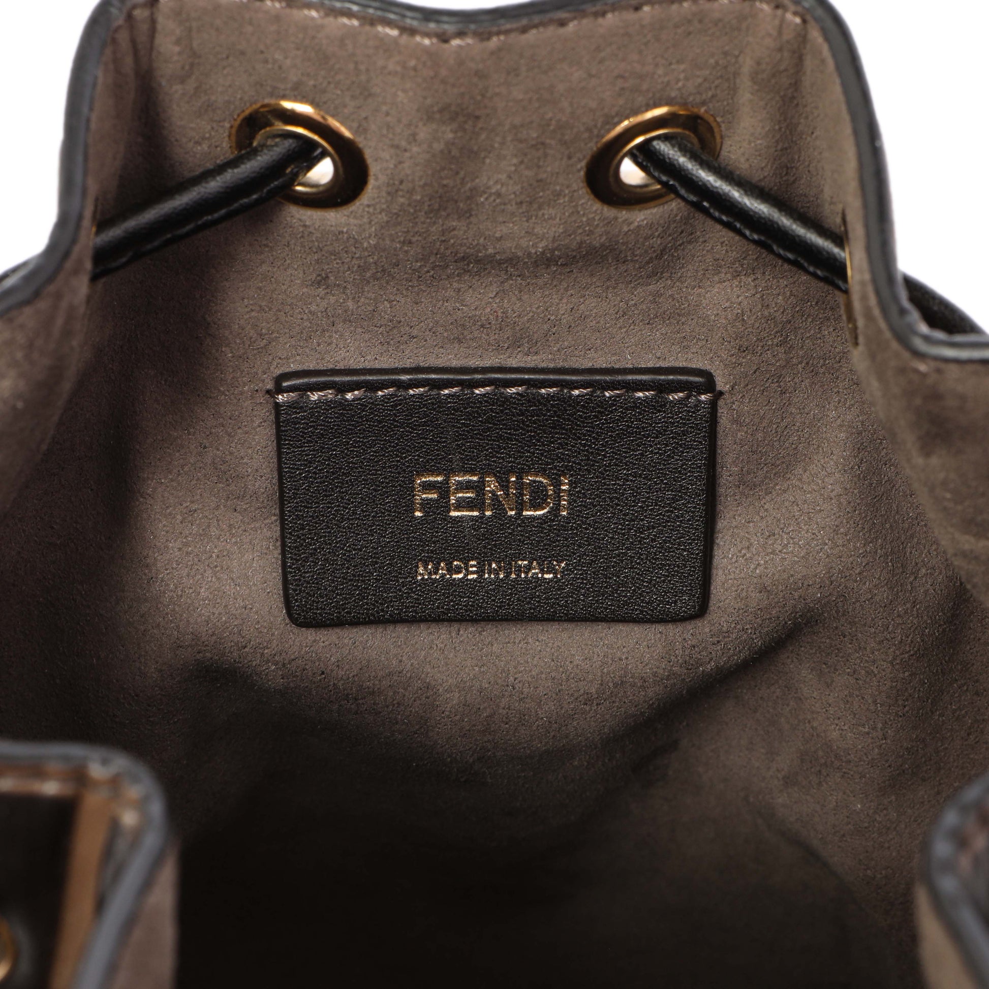 Exclusive Fendi Brown Calfskin Zucca Embossed Mini Mon Tresor Bucket Bag — Lifestyle View