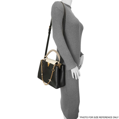 Exclusive Louis Vuitton Black Taurillon Flower Chain Capucines MM — Lifestyle View