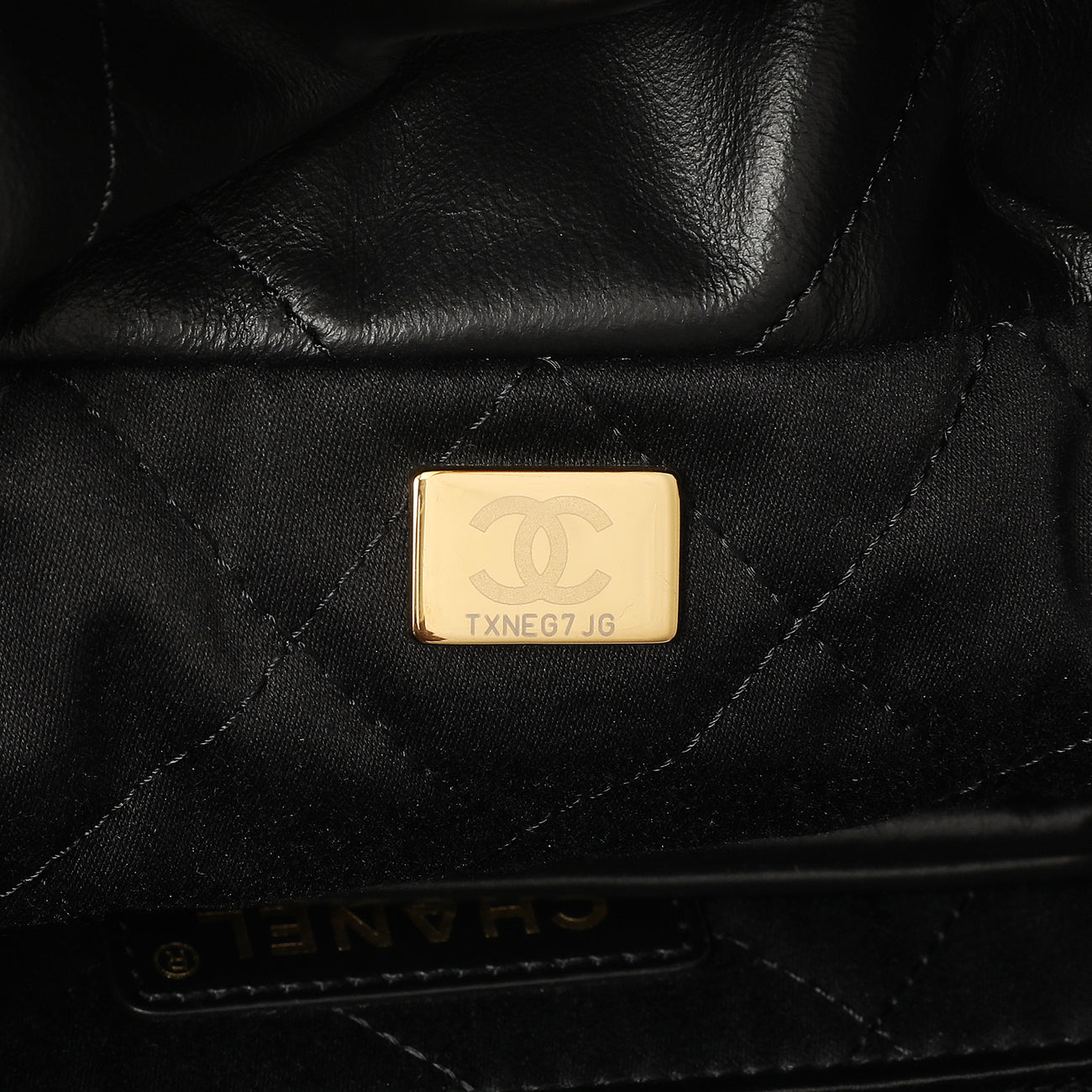 Exclusive Chanel Black Quilted Shiny Calfskin Small 22 — Lifestyle View