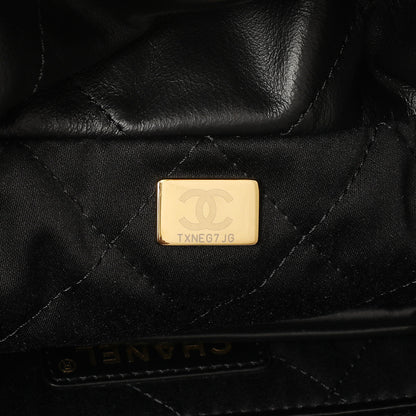 Exclusive Chanel Black Quilted Shiny Calfskin Small 22 — Lifestyle View