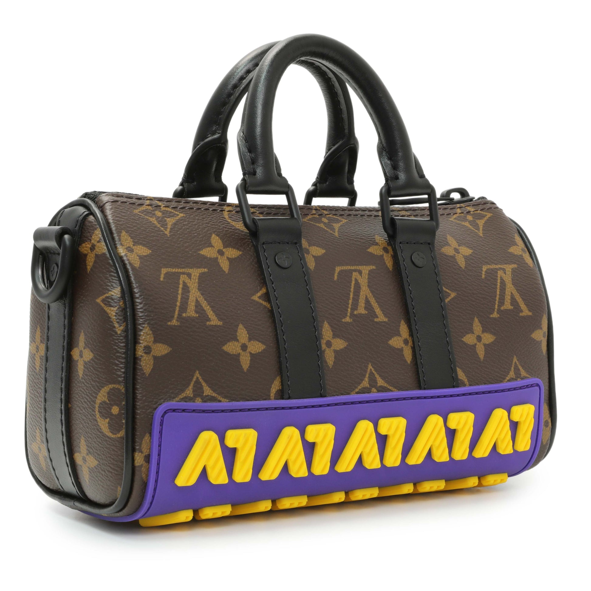 Exclusive Louis Vuitton Monogram LV Rubber Keepall XS — Side View