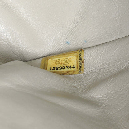 Exclusive Chanel Beige Crinkled Patent Medium Double Flap — Lifestyle View