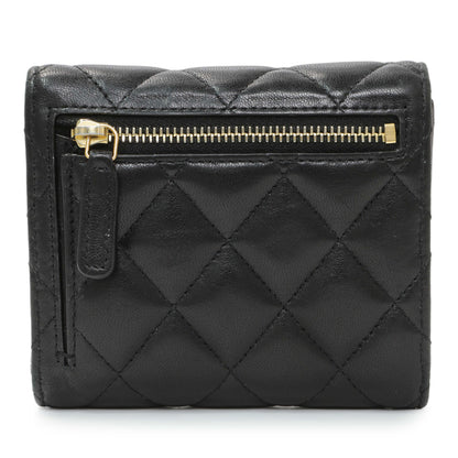Exclusive Chanel Black Quilted Lambskin Small Flap Wallet — Side View