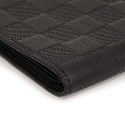Exclusive Louis Vuitton Black Damier Infini Slender Wallet — Lifestyle View