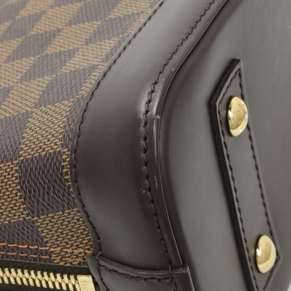 Exclusive Louis Vuitton Damier Ebene Alma BB — Lifestyle View