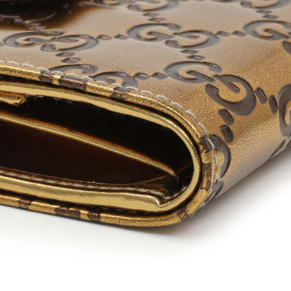 Exclusive Gucci Bronze Guccissima Compact Wallet — Top View