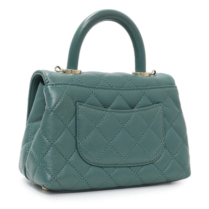 Exclusive Chanel Teal Quilted Caviar Extra Mini Coco Handle Flap — Side View