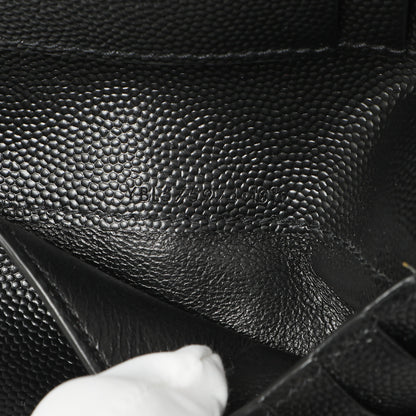 Exclusive Saint Laurent Black Grain De Poudre Matelasse Chevron Monogram Zipped Two-Part Wallet — Lifestyle View