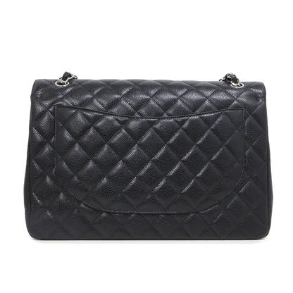 Exclusive Chanel Black  Caviar Maxi Classic Double Flap — Lifestyle View