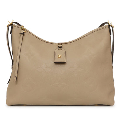 Exclusive Louis Vuitton Tourterelle Empreinte Monogram Giant Carryall MM — Side View