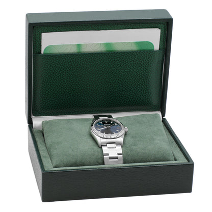 Exclusive Rolex Stainless Steel White Gold Oyster Perpetual 31 77014 — Detail View